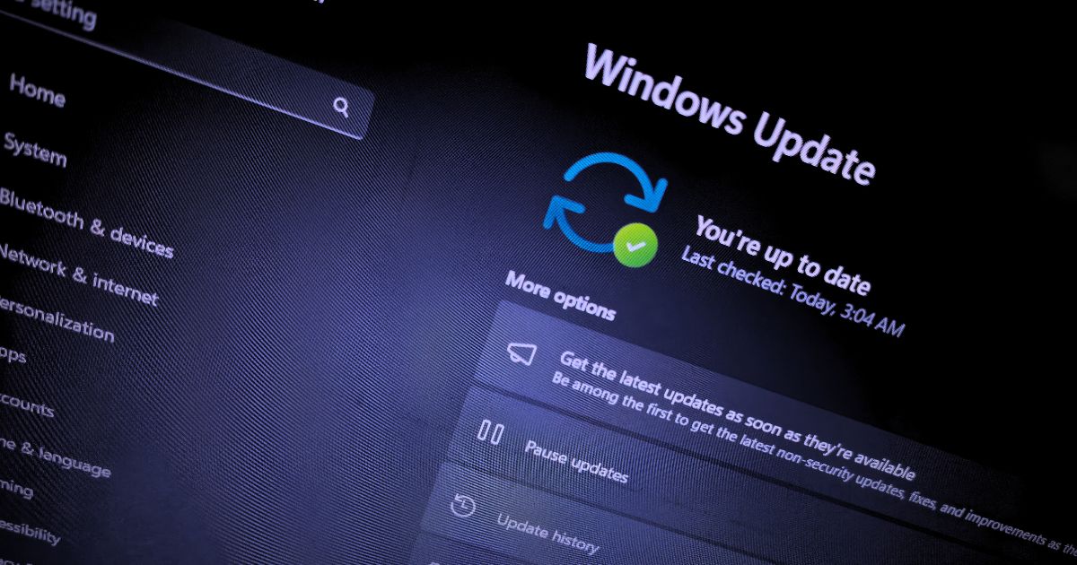 Windows 11 update screen showing ‘You’re up to date’ message with last checked time — Settings panel in dark mode.